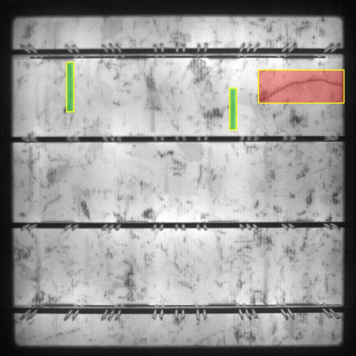 Electroluminescence image of a solar cell with three detector boxes on defects